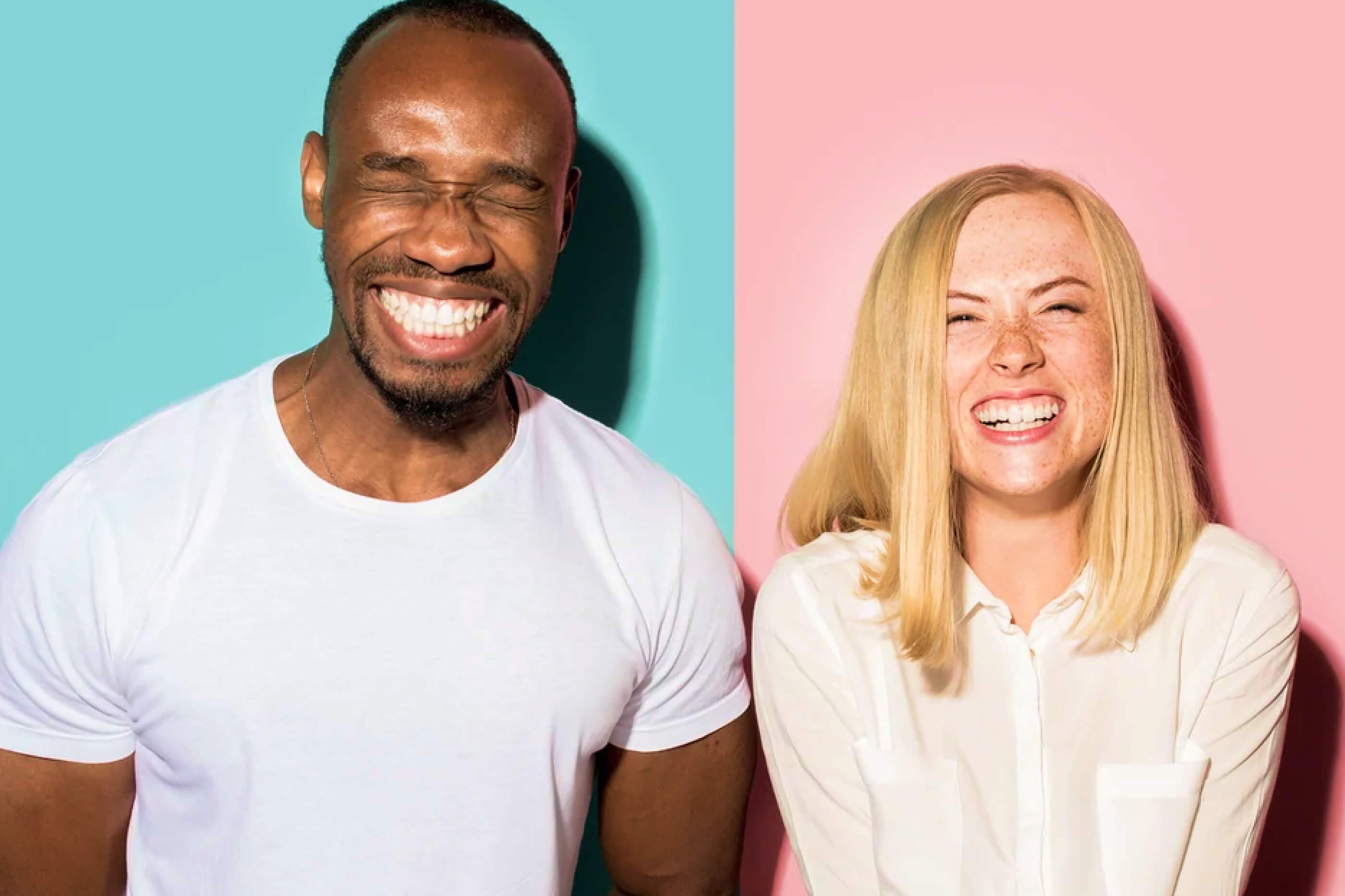 Man and woman smiling.